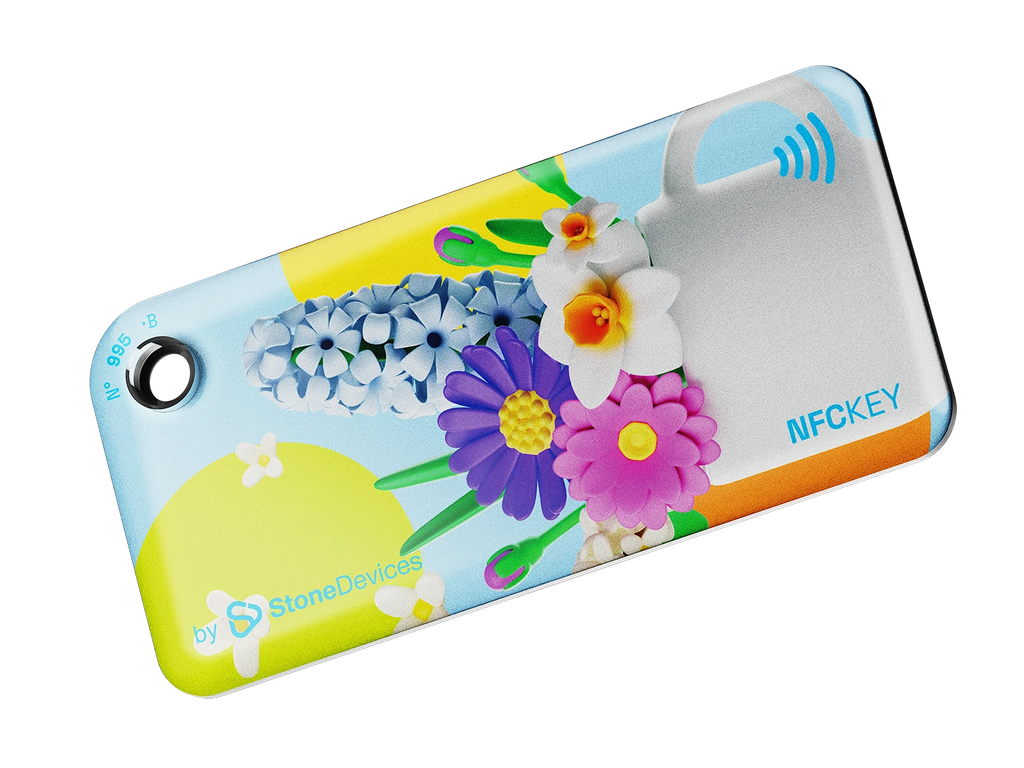 NFC key fob with 3D cartoon multicolor flowers inside a white cup design on a light blue background 