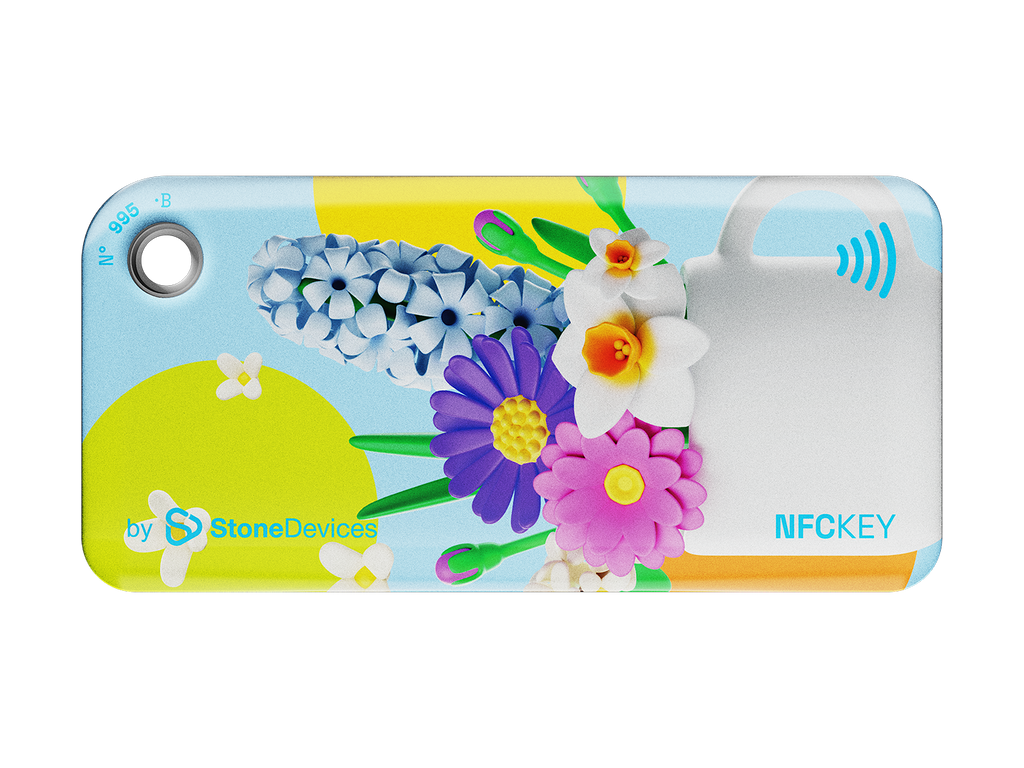 NFC keychain with 3D cartoon multicolor flowers inside a white cup design on a light blue background 