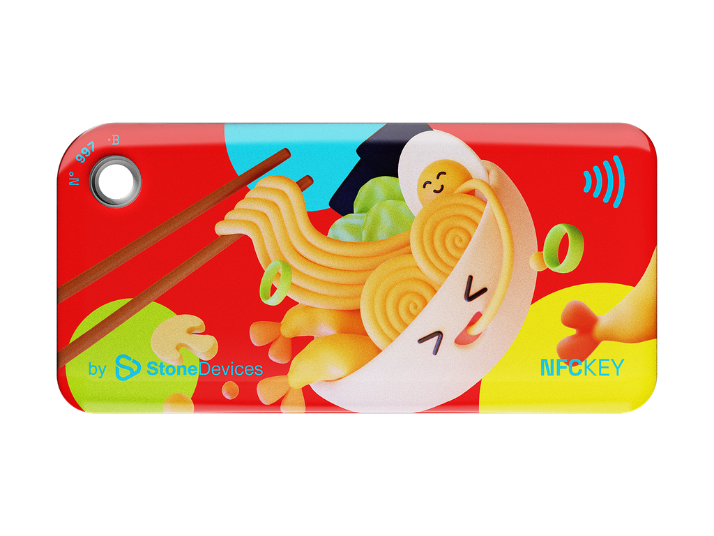 NFC keychain with 3D cartoon ramen bowl and chopsticks design on a red background with multicolor circles