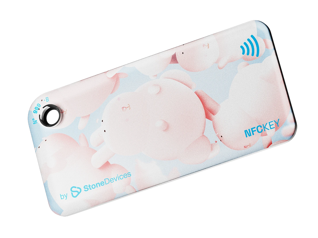NFC keychain with a 3D pink bunny character design on a light blue background