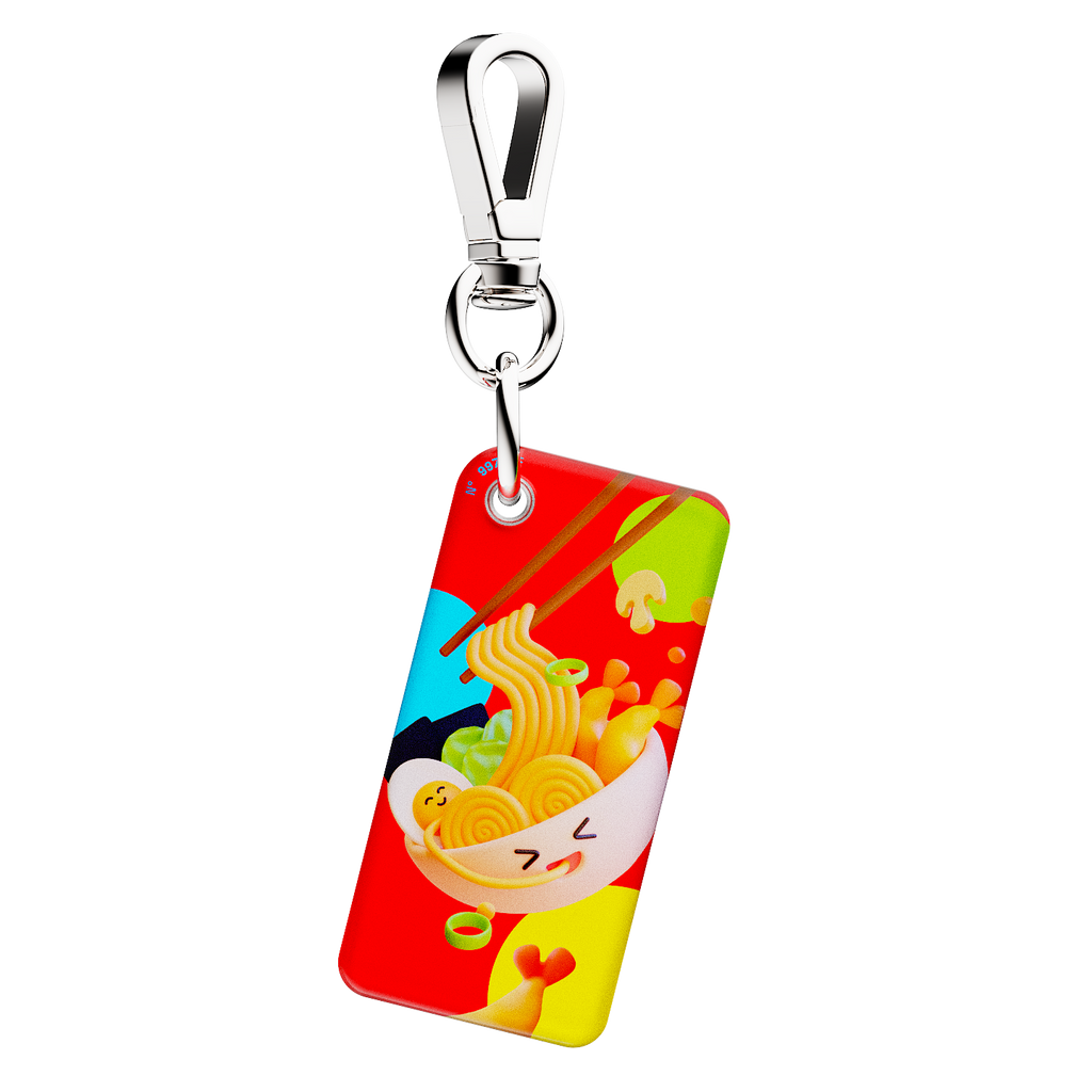 NFC keychain with 3D cartoon bowl of noodles and chopsticks design on a red background with multicolor circles