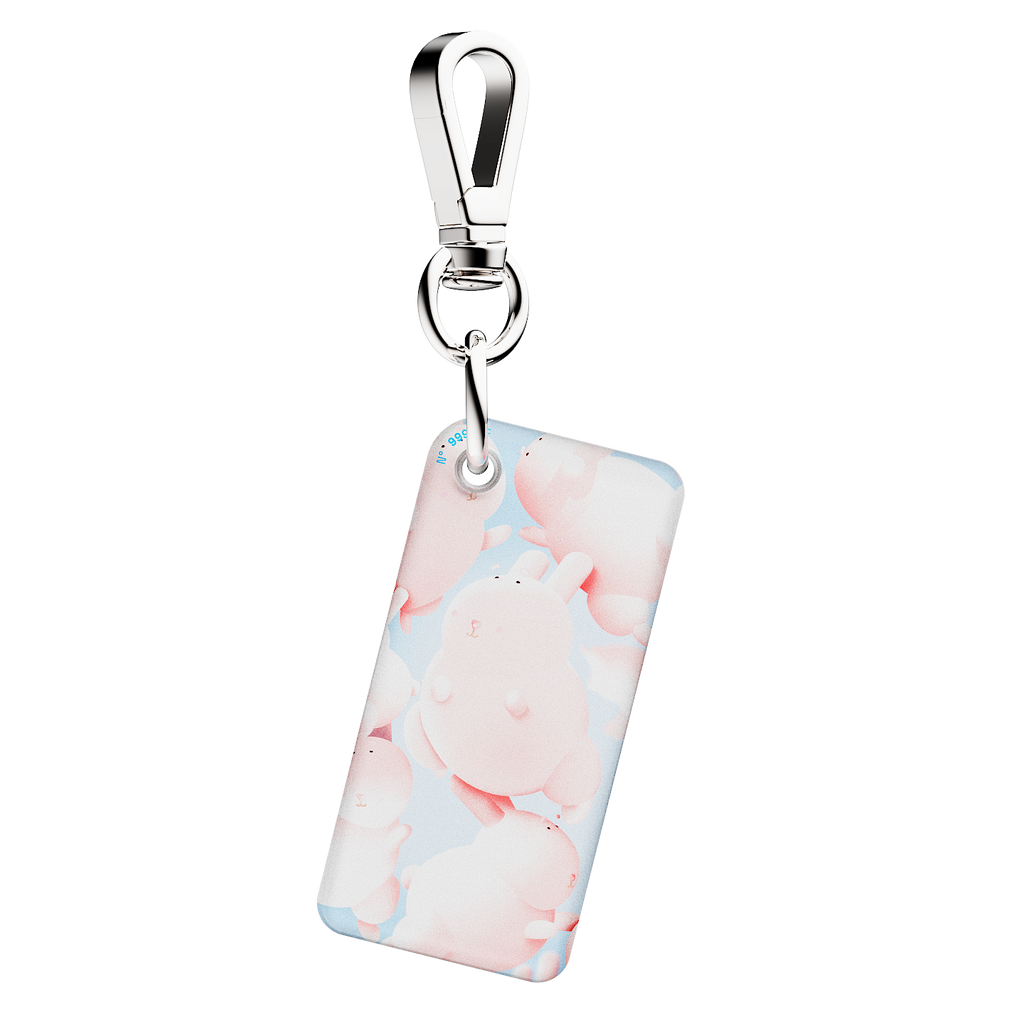 NFC keychain with 3D cute pink bunny character design on a light blue background